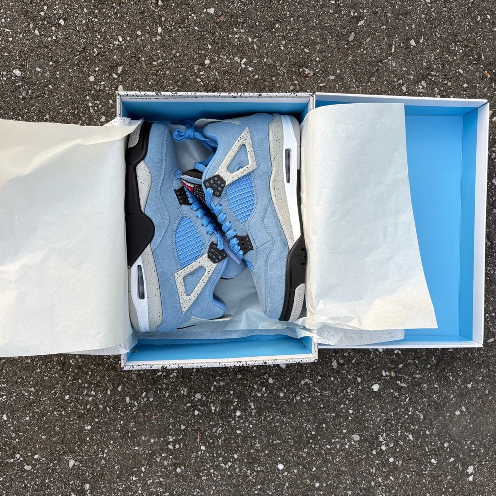 Nike Air Jordan 4 Light Blue and White Low-Top Sneakers